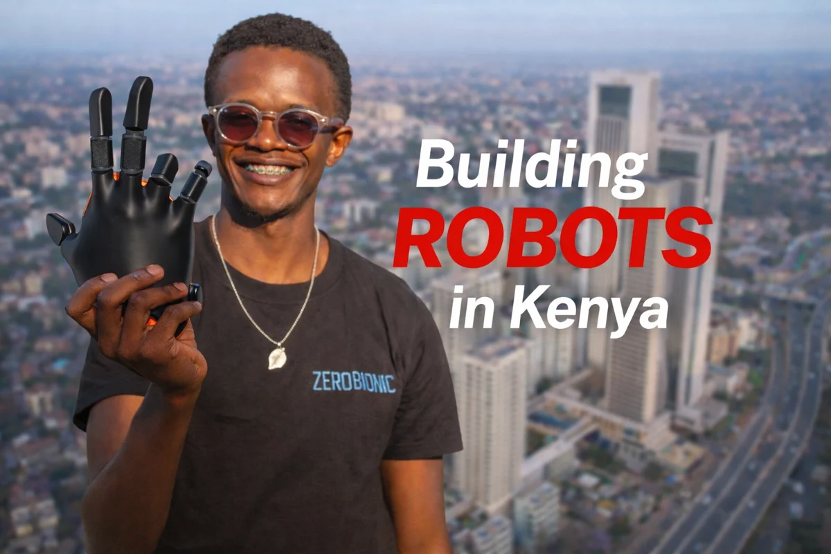Zerobionic founder holding a robotic hand, with Nairobi behind him